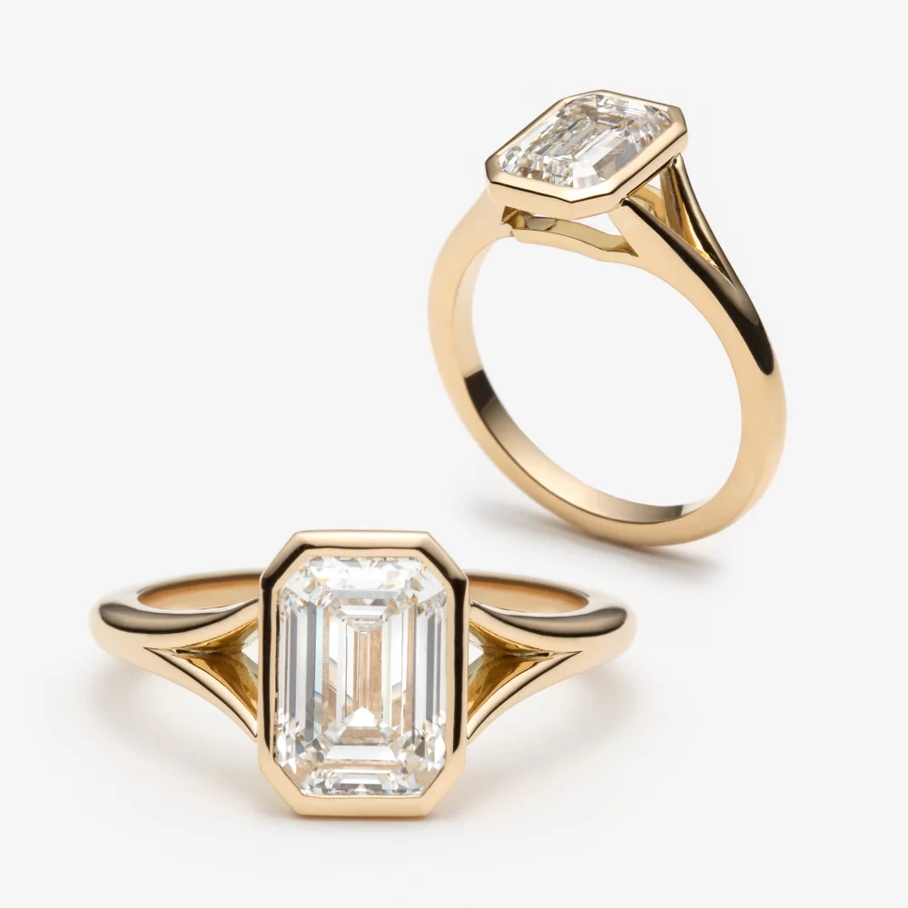 Solitaire serti clos émeraude